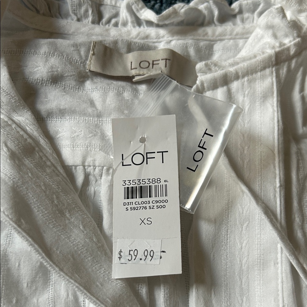 NWT. LOFT Cream Ruffled Top - Picture 2 of 3